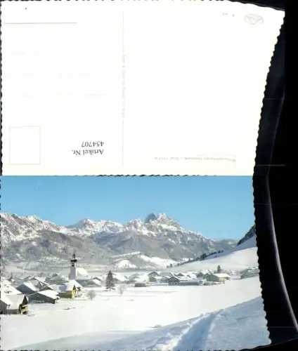 454707,Tannheim Totale m. Rotflüh Bergkulisse Winterbild