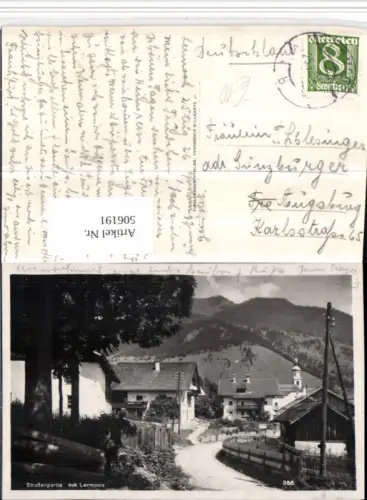 506191,Lermoos Straßenpartie Häuser Kirche Bergkulisse