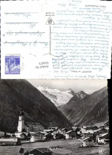 610473,Foto Ak Neustift i. Stubai Ansicht m. Kirche