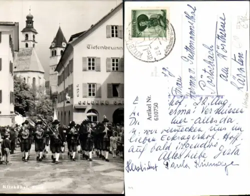 610750,Foto Ak Kitzbühel Ansicht Musikkapelle Tracht Cafe Goldene Gams