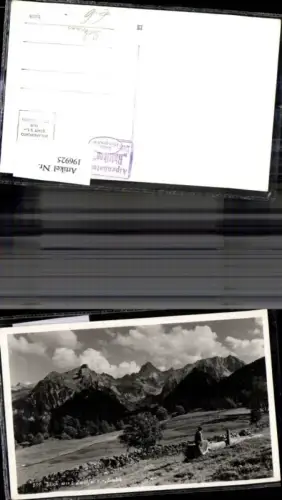 196925,Foto Ak b. Schruns Blick a. Zwölfer u. Zimba Ansicht m. Frau a. Brunnen