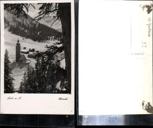307803,Lech am Arlberg Totale Kirche Winterbild pub Foto Schmidt