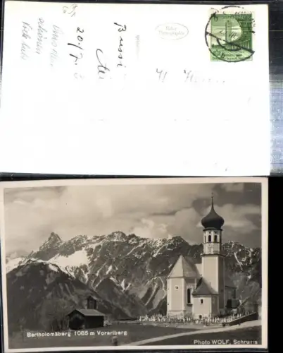 307836,Bartholomäberg Kirche Bergkulisse pub Foto Wolf