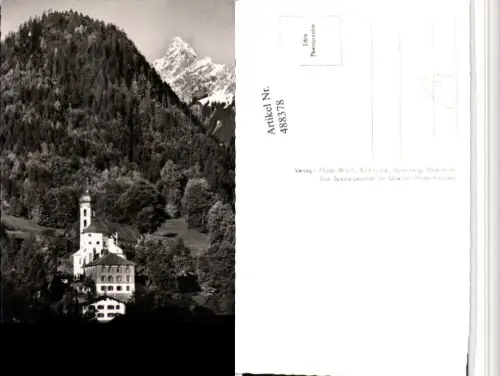 488378,Tschagguns im Montafon Kirche Bergkulisse pub Foto Wolf
