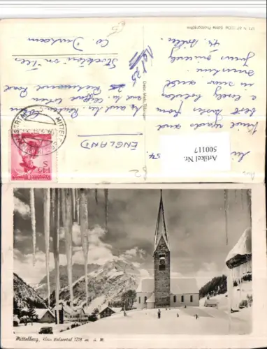 500117,Mittelberg Kirche Bergkulisse Winterbild Eiszapfen