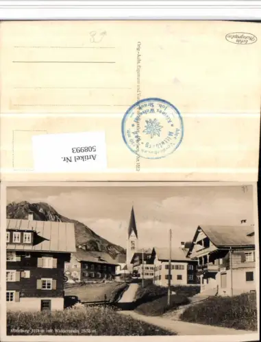508993,Mittelberg Teilansicht Kirche m. Widderstein Bergkulisse