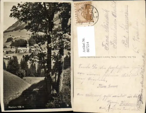 607214,Foto Ak Riezlern Ansicht m. Kirche Baum i. Vordergrund