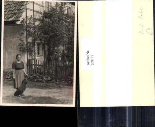 268129,Foto Ak Tiere Hund Dackel v. Haus Gebäude