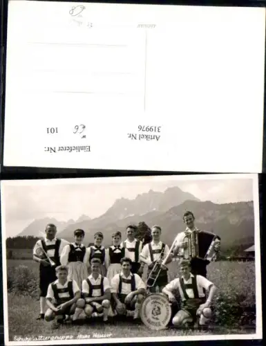 319976,Foto Ak Schuhplattlergruppe Hans Hauser St Johann i. Tirol Gruppenbild Tracht b. Bergkulisse Musik
