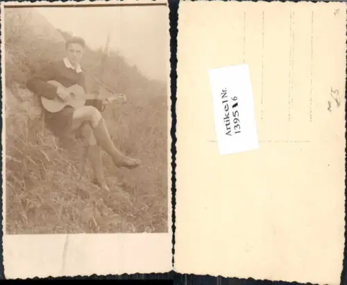 139516,FotoAK Junge mit Gitarre