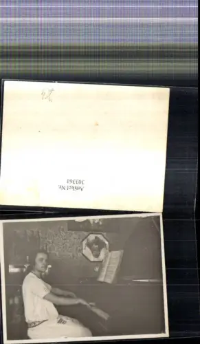 303361,Foto Ak Frau spiel Klavier Musik