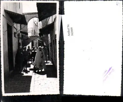 162009,Foto Ak Tetuan Marokko Strassenansicht Frau Burka Esel Religion