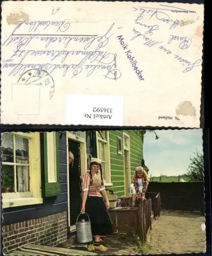 336592,Tracht Holland Frau Mädchen Holzschuhe Kübel Hausansicht