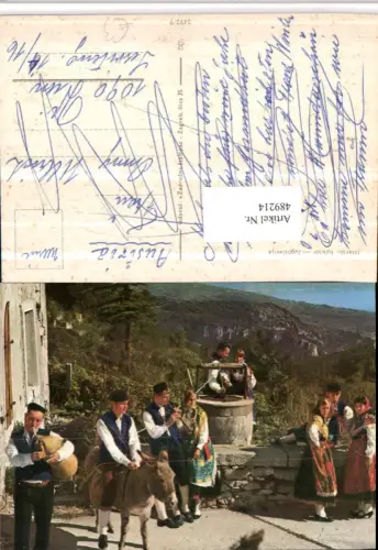 489214,Jugoslavija Kroatien Istarski folklor Trachten Tracht Esel Brunnen