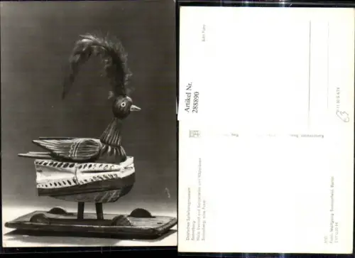 288890,Foto Ak Spiel Spiele Deutsches Spielzeugmuseum Sonneberg Holzvogel m. Räderbrett
