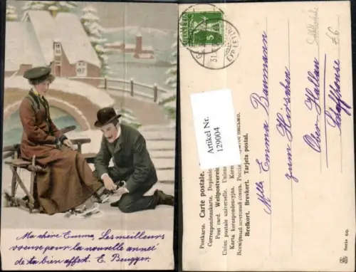 129004,Frau m. Schlittschuhe Eislaufen Mann Hut