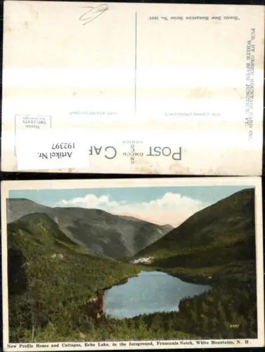 192397,New Hampshire White Mountains Franconia Notch New Profile House and Cottages Echo Lake in the foreground