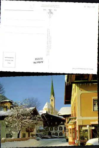 717259 Kirchberg in Tirol Straßenpartie im Winter Kirche
