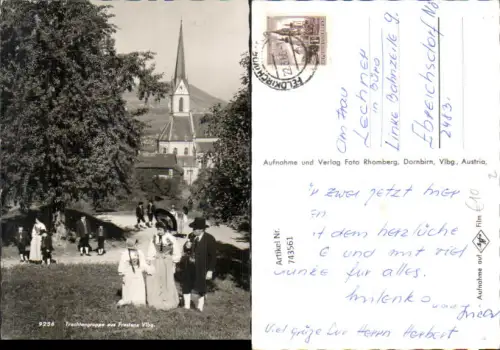 743561 Foto AK Trachtengruppe aus Frastanz Tracht Kirche im Hintergrund