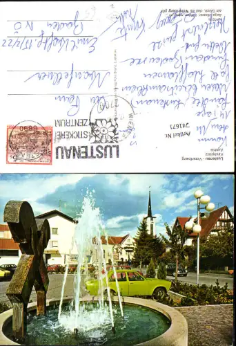 741671 Lustenau Kirchplatz m. Brunnen VW Käfer