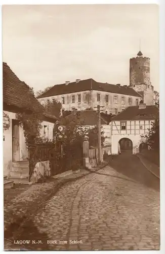 AK, Lagow Neumark, Łagów, Straßenpartie mit Blick zum Schloß, 1934