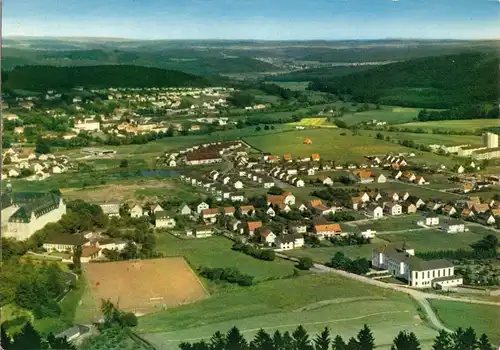AK, Bad Driburg, Neue Siedlung mit Steinberg, Luftbildansicht, um 1970