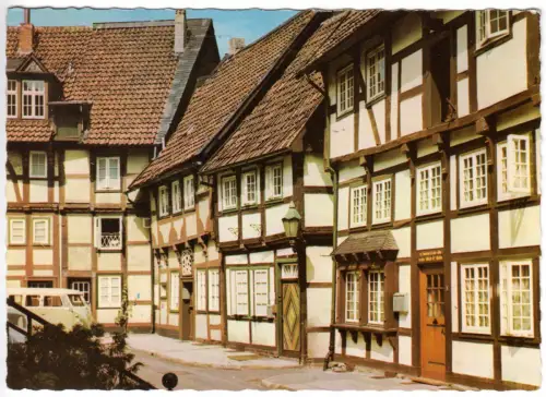 AK, Gütersloh Westf., Fachwerkhäuser am Kirchplatz, um 1968