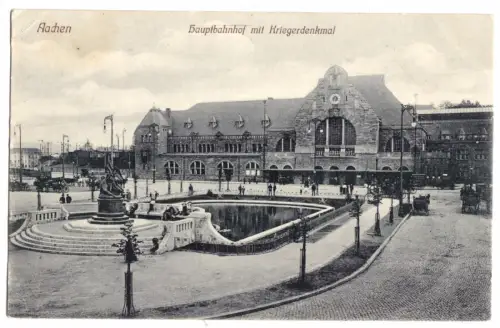 AK, Aachen, Hauptbahnhof mit Kriegerdenkmal, 1909