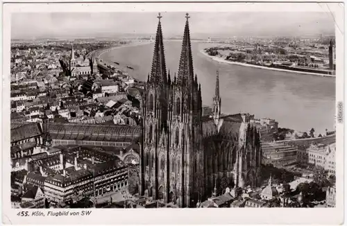 Köln Coellen /  Cöln Flugbild von SW mit Bahnhof und Dom Foto Ansichtskarte 1934