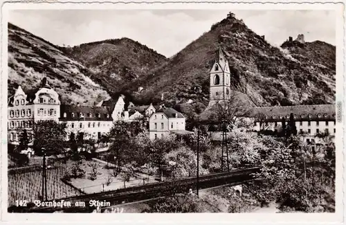 Bornhafen Blick auf Gärten der Stadt und Kirche mit Bergen im Hintergrund 1962 