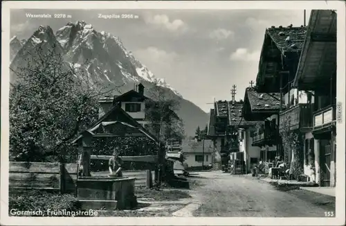 Ansichtskarte Garmisch-Partenkirchen Brunnen, Frühlingsstrasse 1938 