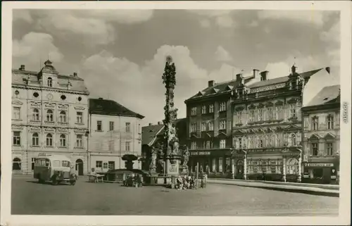Ansichtskarte Dux Duchcov Rathausplatz mit Pestsäule 1958