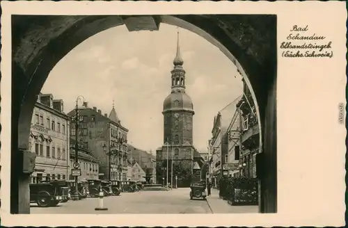 Ansichtskarte Bad Schandau Kirche, Platz, Geschäfte, Autos 1940