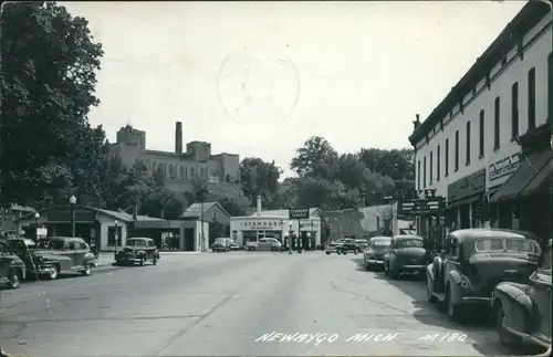 Postcard Newaygo Street with old cars 1951