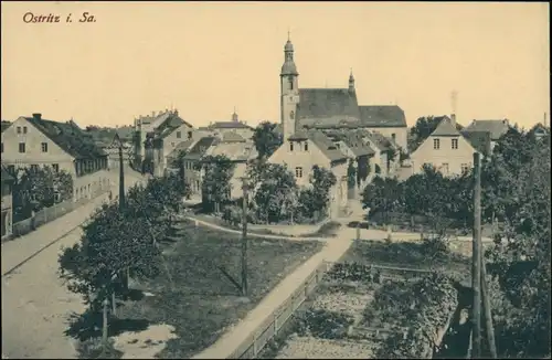 Ansichtskarte Ostritz (Oberlausitz) Wostrowc Straße, Kirche, Wohnhäuser 1914