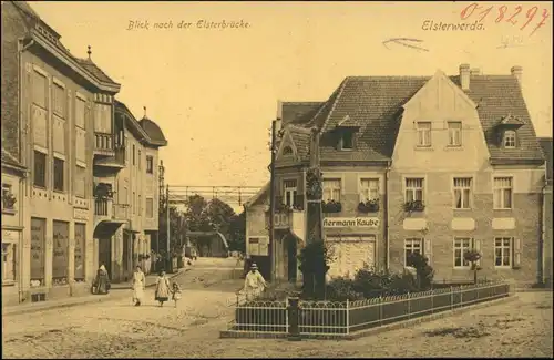 Ansichtskarte Elsterwerda Wikow Straße, Brücke - Geschäfte 1918