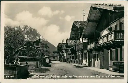 Garmisch-Garmisch-Partenkirchen Garmisch, Frühlingsstraße mit Waxensteinen u. Zugspitze 1935