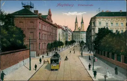 Ansichtskarte  Straßenbahn, Häuser Partie i.d. Wilhelmstraße 1917