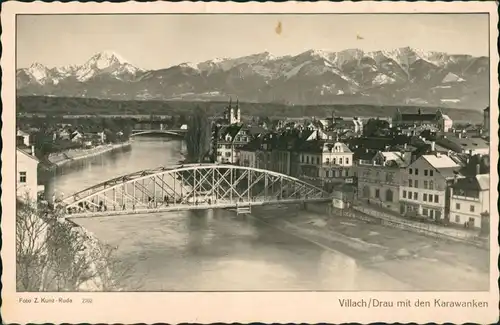 Villach Karawanken Blick, Bus passiert Stahlbau Brücke der Drau 1940