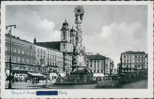 Ansichtskarte Linz alte Autos, Geschäfte, Restaurant am ehem. A.H.Platz 1940