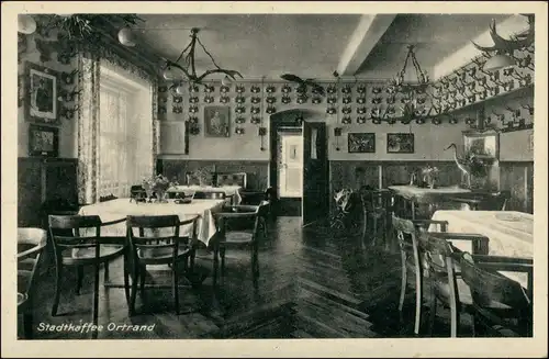 Ansichtskarte Ortrand Stadtcafe - Gaststube 1934