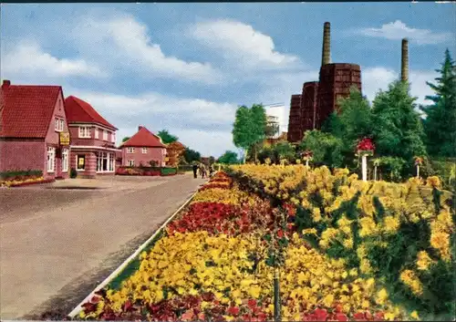 Ansichtskarte Wiesmoor Straße, Blumenschmuck Fabriken 1965