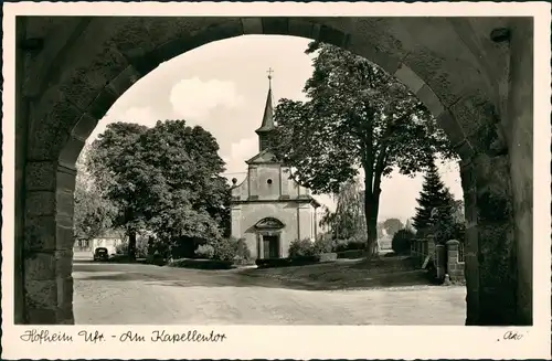 Ansichtskarte Hofheim Strassen Partie am Kapellentor mit Kirche 1950