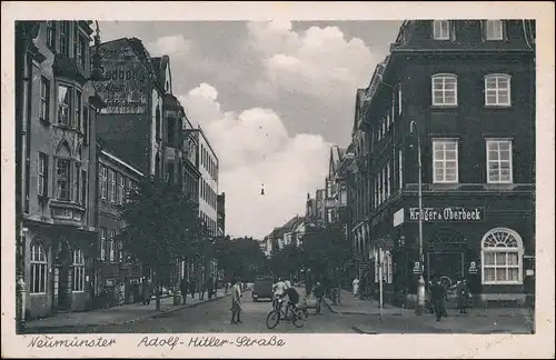 Ansichtskarte Neumünster Straße - Geschäft Krüger Oberbeck 1937