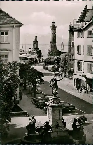Lindau (Bodensee) Partie am Hafen mit Leuchturm Autos ua. Mercedes, VW Golf uvm. 1953
