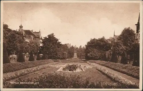 Ansichtskarte Krefeld Crefeld Bismarckplatz Grünanlagen mit Denkmal 1920