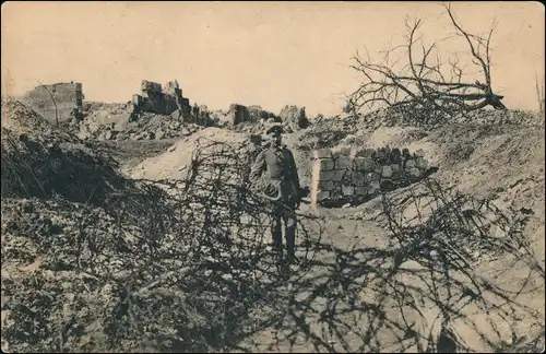 Ansichtskarte  Soldat mit Stacheldraht, Zerstörung 1. Weltkrieg 1916