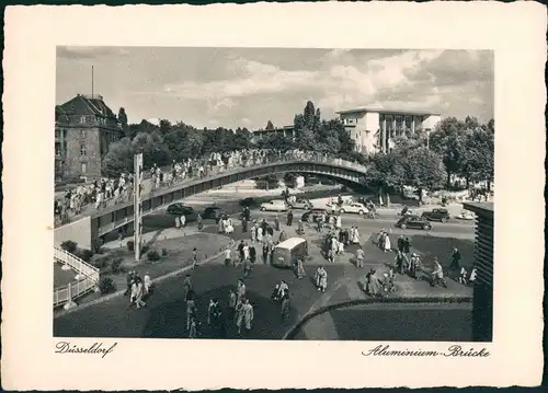 Ansichtskarte Düsseldorf Aluminiumbrücke, Straße belebt 1934