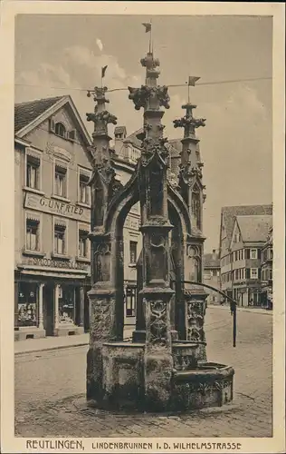 Ansichtskarte Reutlingen Wilhelmstraße, Lindenbrunnen - Geschäfte 1918