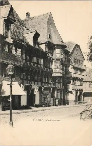 Ansichtskarte Goslar Marktstraße mit Personen vor Geschäft Carl H. 1900
